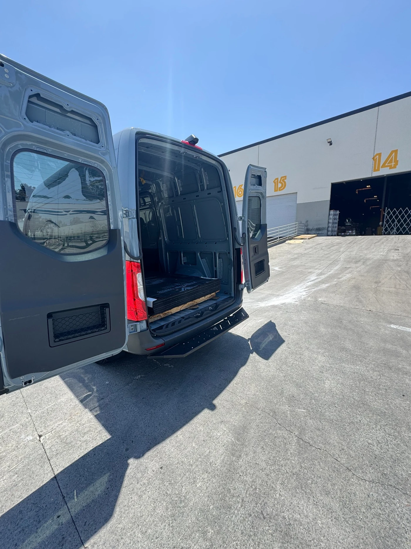 Driftline Express Sprinter van at a warehouse loading dock